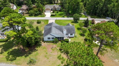Welcome to this beautiful 3-bedroom, 2-bath home nestled in the on Harbour Point Golf Club in North Carolina - for sale on GolfHomes.com, golf home, golf lot