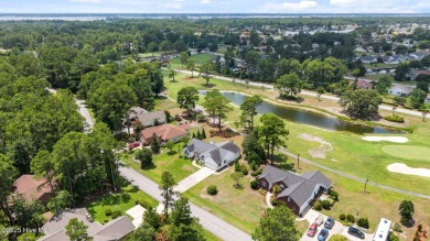 Welcome to this beautiful 3-bedroom, 2-bath home nestled in the on Harbour Point Golf Club in North Carolina - for sale on GolfHomes.com, golf home, golf lot