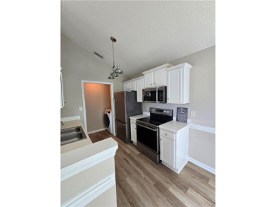 Welcome to this beautifully updated 2-bedroom, 2-bath condo in on Riverfront Golf Club in Virginia - for sale on GolfHomes.com, golf home, golf lot
