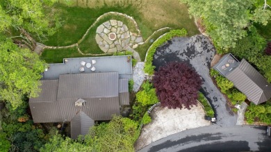 This enchanting single-level mountain home at 630 Cobb Road on Highlands Country Club in North Carolina - for sale on GolfHomes.com, golf home, golf lot