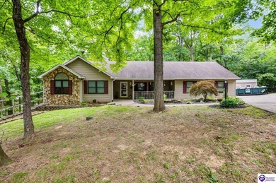 This inviting 3-bedroom, 2-bath ranch home is nestled among on Doe Valley Country Club in Kentucky - for sale on GolfHomes.com, golf home, golf lot