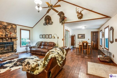 This inviting 3-bedroom, 2-bath ranch home is nestled among on Doe Valley Country Club in Kentucky - for sale on GolfHomes.com, golf home, golf lot