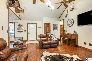 This inviting 3-bedroom, 2-bath ranch home is nestled among on Doe Valley Country Club in Kentucky - for sale on GolfHomes.com, golf home, golf lot