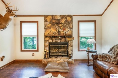This inviting 3-bedroom, 2-bath ranch home is nestled among on Doe Valley Country Club in Kentucky - for sale on GolfHomes.com, golf home, golf lot