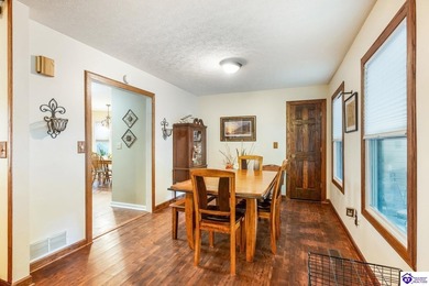 This inviting 3-bedroom, 2-bath ranch home is nestled among on Doe Valley Country Club in Kentucky - for sale on GolfHomes.com, golf home, golf lot