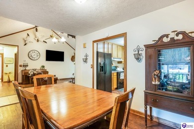 This inviting 3-bedroom, 2-bath ranch home is nestled among on Doe Valley Country Club in Kentucky - for sale on GolfHomes.com, golf home, golf lot