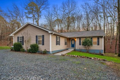 Welcome to your dream home! This 3-4 bedroom house is nestled in on Diamondhead Golf and Country Club in Arkansas - for sale on GolfHomes.com, golf home, golf lot