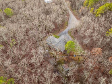 Welcome to your dream home! This 3-4 bedroom house is nestled in on Diamondhead Golf and Country Club in Arkansas - for sale on GolfHomes.com, golf home, golf lot