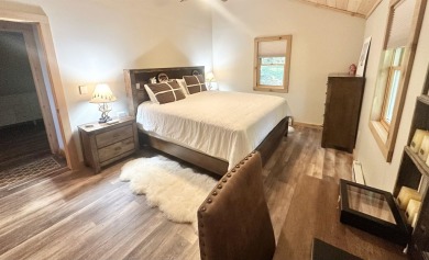 Welcome to this beautifully updated 3-bedroom, 2-bathroom home on Hermitage Club Golf Course in Vermont - for sale on GolfHomes.com, golf home, golf lot
