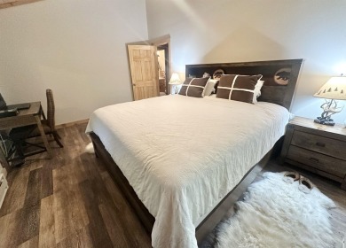 Welcome to this beautifully updated 3-bedroom, 2-bathroom home on Hermitage Club Golf Course in Vermont - for sale on GolfHomes.com, golf home, golf lot