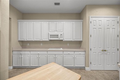 Beautiful Hampton model with concrete block construction located on Eagle Ridge At Spruce Creek Country Club in Florida - for sale on GolfHomes.com, golf home, golf lot