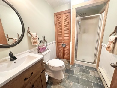 Welcome to this beautifully updated 3-bedroom, 2-bathroom home on Hermitage Club Golf Course in Vermont - for sale on GolfHomes.com, golf home, golf lot