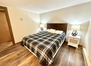 Welcome to this beautifully updated 3-bedroom, 2-bathroom home on Hermitage Club Golf Course in Vermont - for sale on GolfHomes.com, golf home, golf lot