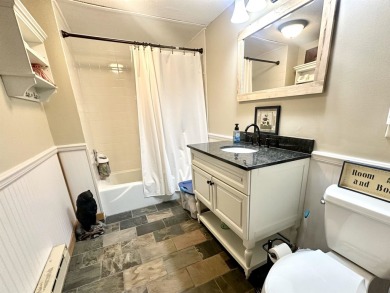 Welcome to this beautifully updated 3-bedroom, 2-bathroom home on Hermitage Club Golf Course in Vermont - for sale on GolfHomes.com, golf home, golf lot