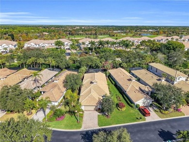 Located in the Cotton Green neighborhood of Fiddler's Creek on The Rookery At Marco in Florida - for sale on GolfHomes.com, golf home, golf lot