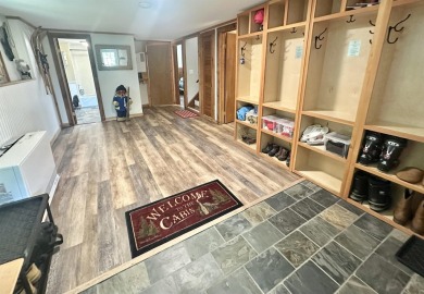 Welcome to this beautifully updated 3-bedroom, 2-bathroom home on Hermitage Club Golf Course in Vermont - for sale on GolfHomes.com, golf home, golf lot