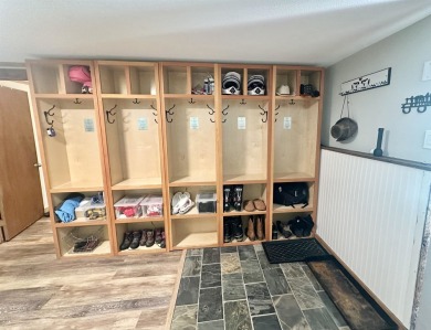 Welcome to this beautifully updated 3-bedroom, 2-bathroom home on Hermitage Club Golf Course in Vermont - for sale on GolfHomes.com, golf home, golf lot