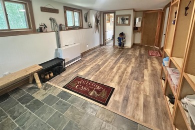 Welcome to this beautifully updated 3-bedroom, 2-bathroom home on Hermitage Club Golf Course in Vermont - for sale on GolfHomes.com, golf home, golf lot