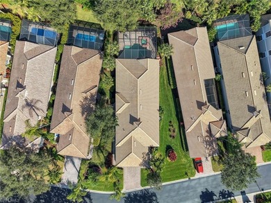 Located in the Cotton Green neighborhood of Fiddler's Creek on The Rookery At Marco in Florida - for sale on GolfHomes.com, golf home, golf lot