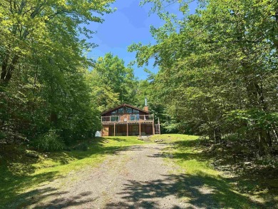Welcome to this beautifully updated 3-bedroom, 2-bathroom home on Hermitage Club Golf Course in Vermont - for sale on GolfHomes.com, golf home, golf lot