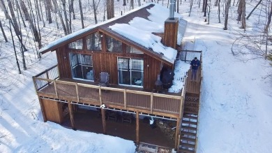 Welcome to this beautifully updated 3-bedroom, 2-bathroom home on Hermitage Club Golf Course in Vermont - for sale on GolfHomes.com, golf home, golf lot