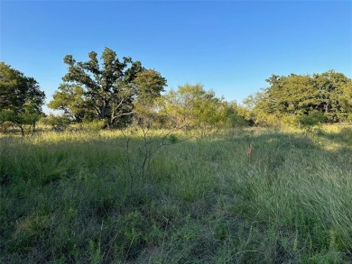 Here is a nice lot to build your dream home on (adjoining lot on Hideout Golf Club and Resort  in Texas - for sale on GolfHomes.com, golf home, golf lot