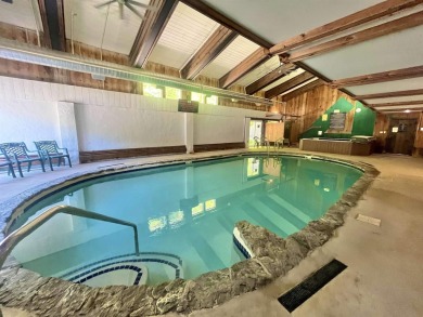Welcome to this beautifully updated 3-bedroom, 2-bathroom home on Hermitage Club Golf Course in Vermont - for sale on GolfHomes.com, golf home, golf lot