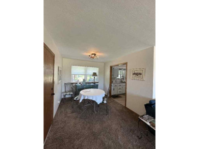 Welcome to this stunning 3-bedroom, 2-bathroom home located just on Sunset Hills Golf Course in Oklahoma - for sale on GolfHomes.com, golf home, golf lot