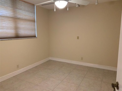 This is a lovely condo located in the well sort after community on Pine Island Ridge Country Club in Florida - for sale on GolfHomes.com, golf home, golf lot