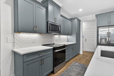 Practically brand new and barely lived in, this 2024 Aspen Ridge on Harbor Club Golf and Country Club in Georgia - for sale on GolfHomes.com, golf home, golf lot