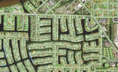 If you are looking for waterfront living with a small community on Saint Andrews South Golf Club in Florida - for sale on GolfHomes.com, golf home, golf lot