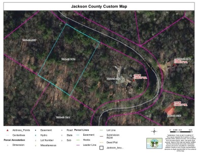 This Buildable wooded lot in Sapphire's Holly Forest features an on Sapphire National Golf Club in North Carolina - for sale on GolfHomes.com, golf home, golf lot