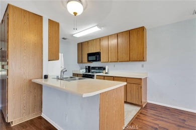 Welcome to this delightful two-bedroom, one-bath condominium on Silver Lakes Golf Course in California - for sale on GolfHomes.com, golf home, golf lot