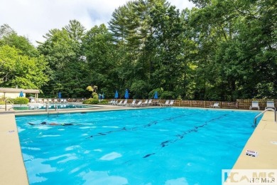 This Buildable wooded lot in Sapphire's Holly Forest features an on Sapphire National Golf Club in North Carolina - for sale on GolfHomes.com, golf home, golf lot