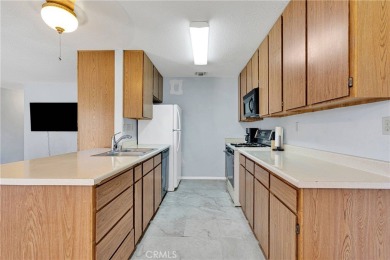 Welcome to this delightful two-bedroom, one-bath condominium on Silver Lakes Golf Course in California - for sale on GolfHomes.com, golf home, golf lot
