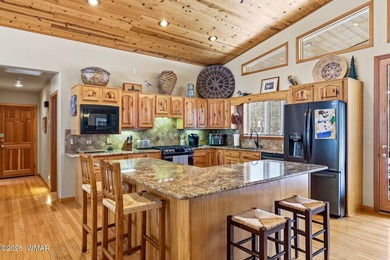 Tucked among the tall pines of Pinetop Country Club, this on Pinetop Lakes Country Club in Arizona - for sale on GolfHomes.com, golf home, golf lot