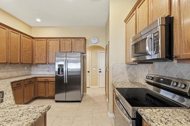 Discover this beautifully maintained single-story home tucked on Wildhorse Golf Club of Robson Ranch in Texas - for sale on GolfHomes.com, golf home, golf lot