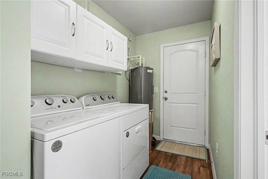 Welcome to this charming home nestled in a VERY FRIENDLY, GATED on Copperhead Golf Club in Florida - for sale on GolfHomes.com, golf home, golf lot