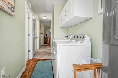 Welcome to this charming home nestled in a VERY FRIENDLY, GATED on Copperhead Golf Club in Florida - for sale on GolfHomes.com, golf home, golf lot