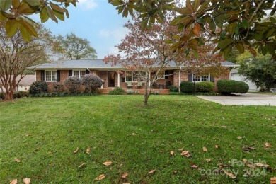 Beautiful single story ranch overlooking Pine Island Country on Pine Island Country Club in North Carolina - for sale on GolfHomes.com, golf home, golf lot