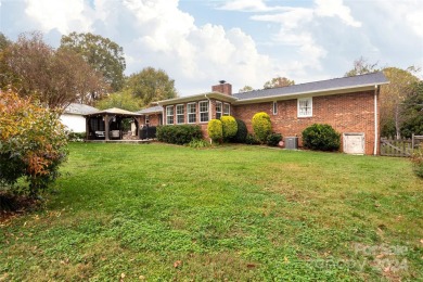 Beautiful single story ranch overlooking Pine Island Country on Pine Island Country Club in North Carolina - for sale on GolfHomes.com, golf home, golf lot