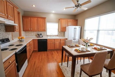 Open living room/dining room. Expensive carpet throughout. The on Hunters Ridge Golf Course in Iowa - for sale on GolfHomes.com, golf home, golf lot