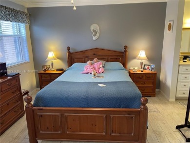 Welcome home to this spacious, remodeled unit in the highly on Sunrise Lakes Phase IV Golf Course in Florida - for sale on GolfHomes.com, golf home, golf lot