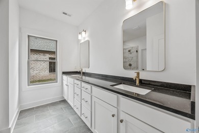 This beautifully crafted residence features an open floor plan on Canebrake Golf Club in AL - for sale on GolfHomes.com, golf home, golf lot