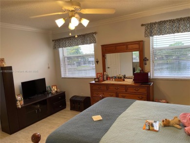 Welcome home to this spacious, remodeled unit in the highly on Sunrise Lakes Phase IV Golf Course in Florida - for sale on GolfHomes.com, golf home, golf lot
