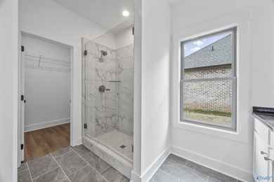 This beautifully crafted residence features an open floor plan on Canebrake Golf Club in AL - for sale on GolfHomes.com, golf home, golf lot