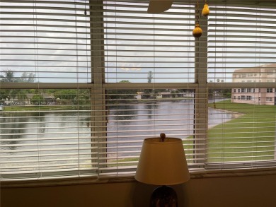 Welcome home to this spacious, remodeled unit in the highly on Sunrise Lakes Phase IV Golf Course in Florida - for sale on GolfHomes.com, golf home, golf lot