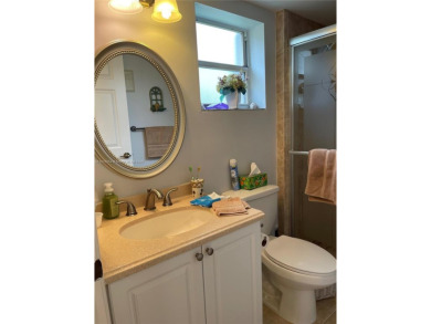Welcome home to this spacious, remodeled unit in the highly on Sunrise Lakes Phase IV Golf Course in Florida - for sale on GolfHomes.com, golf home, golf lot