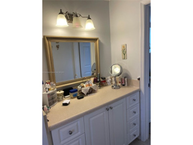 Welcome home to this spacious, remodeled unit in the highly on Sunrise Lakes Phase IV Golf Course in Florida - for sale on GolfHomes.com, golf home, golf lot