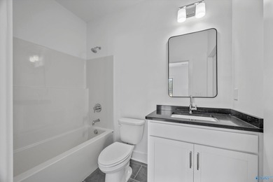 This beautifully crafted residence features an open floor plan on Canebrake Golf Club in AL - for sale on GolfHomes.com, golf home, golf lot